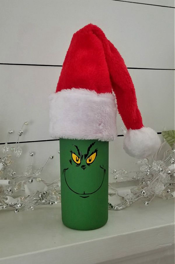 Handcrafted Grinch-themed wine bottle