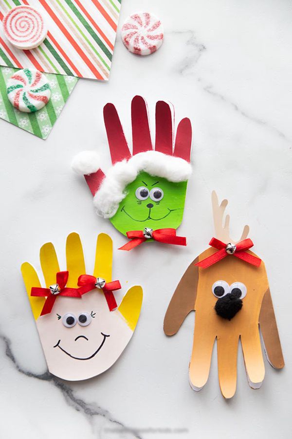 Child's handprint turned into Grinch for Christmas craft