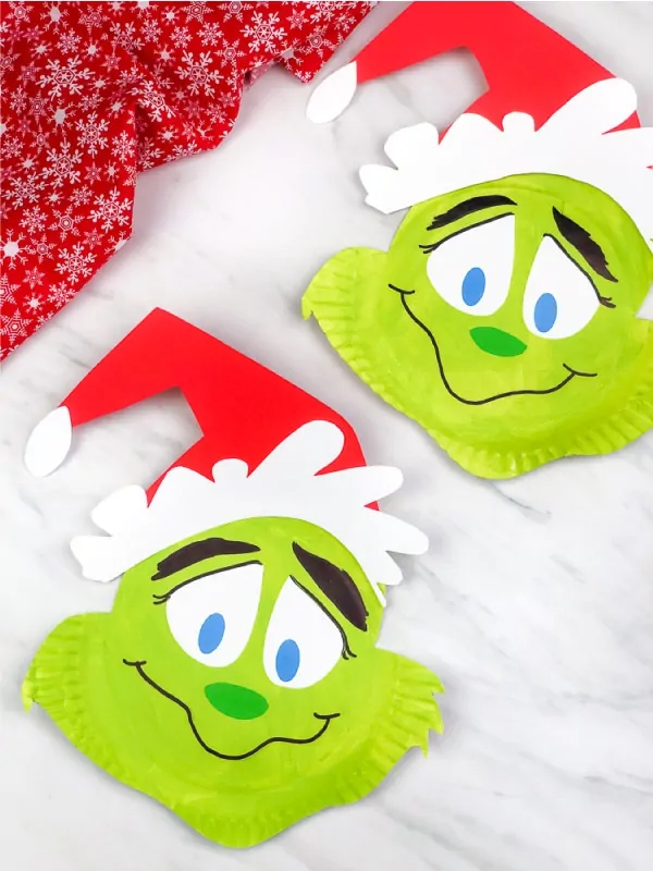 Grinch craft made from a paper plate