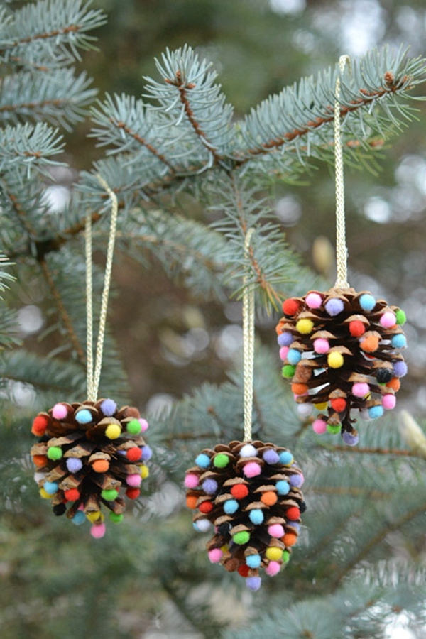 Christmas ornaments made with pom-poms and pinecones